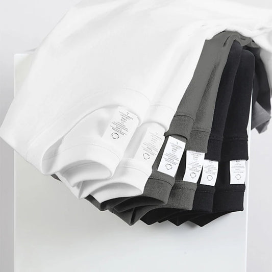 Camisetas lisas de algodón 100% para hombre y mujer